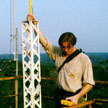 Taking scientific measurements at the top of the tower